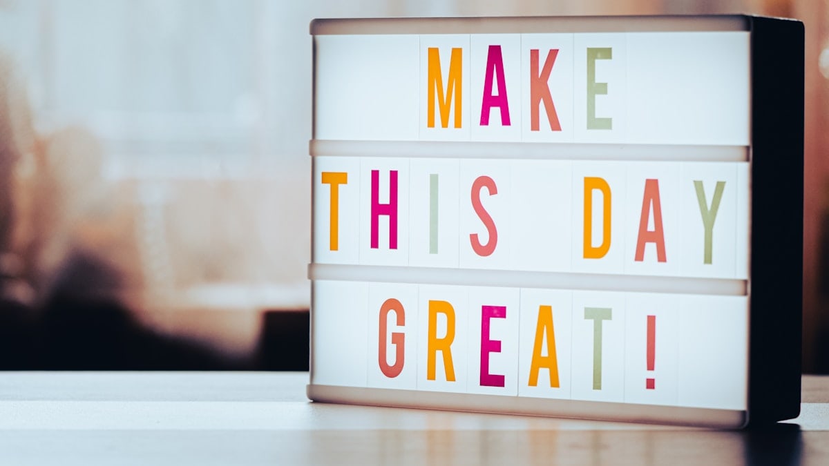 a light box that says make this day great